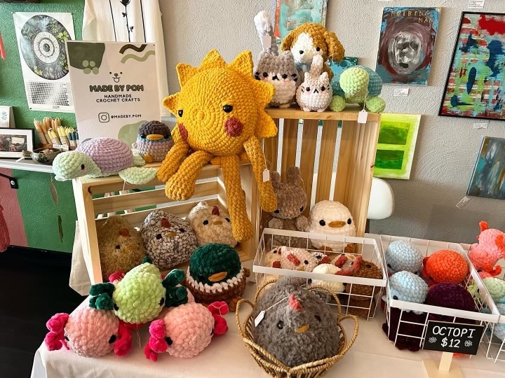Made by Pom set up with many crochet animals
