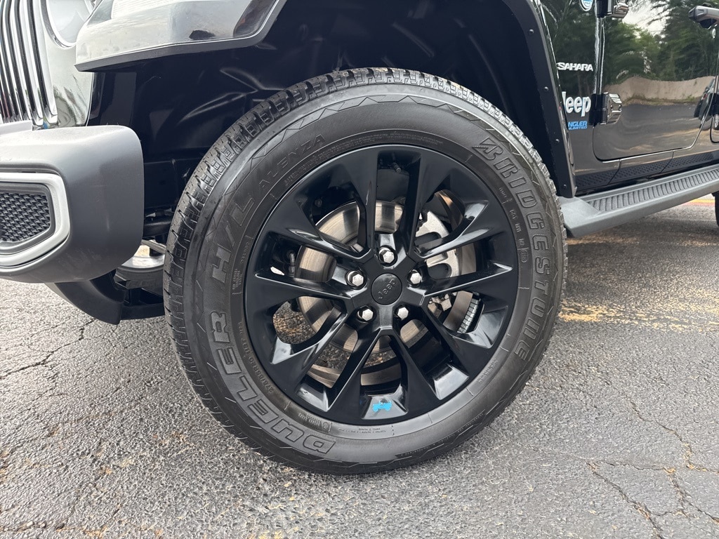 Used 2022 Jeep Wrangler Unlimited Sahara 4XE with VIN 1C4JJXP6XNW222568 for sale in Longview, TX