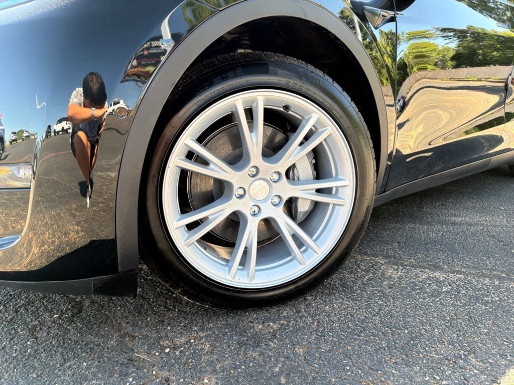 Used 2022 Tesla Model Y Long Range with VIN 7SAYGDEE4NF442253 for sale in Longview, TX