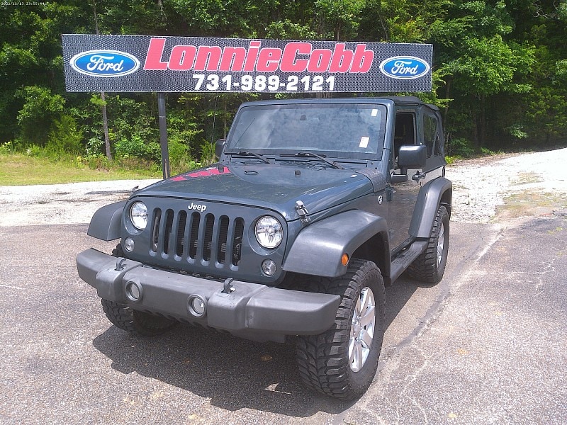 Used 2016 Jeep Wrangler Sport with VIN 1C4AJWAGXGL281619 for sale in Henderson, TN