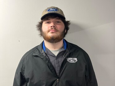 Staff member Logan Nelson from 1c19b7662519