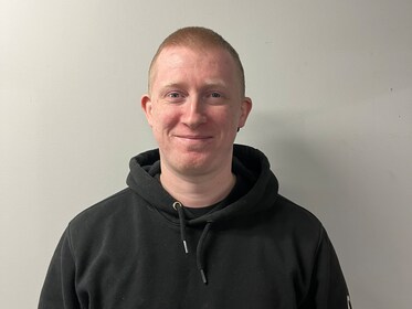 Staff member C.J. Loberg from 1c19b7662519