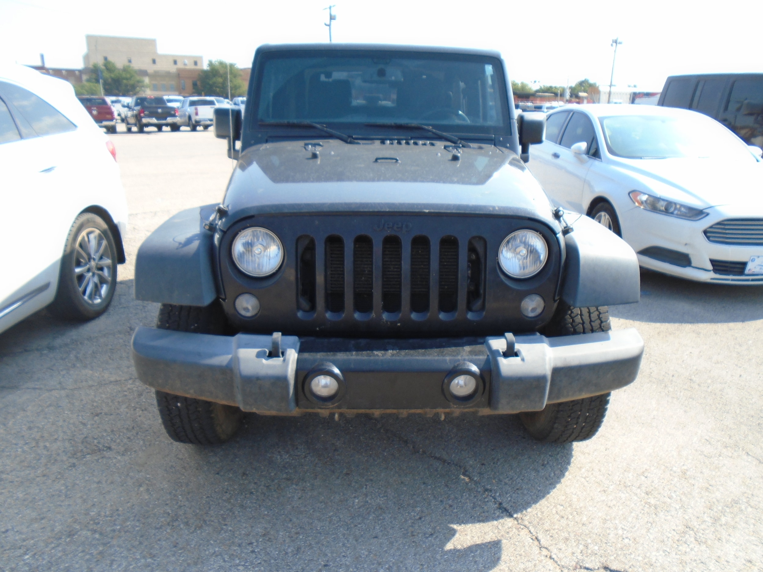 Used 2016 Jeep Wrangler Willys Wheeler with VIN 1C4AJWAG7GL264731 for sale in Dodge City, KS