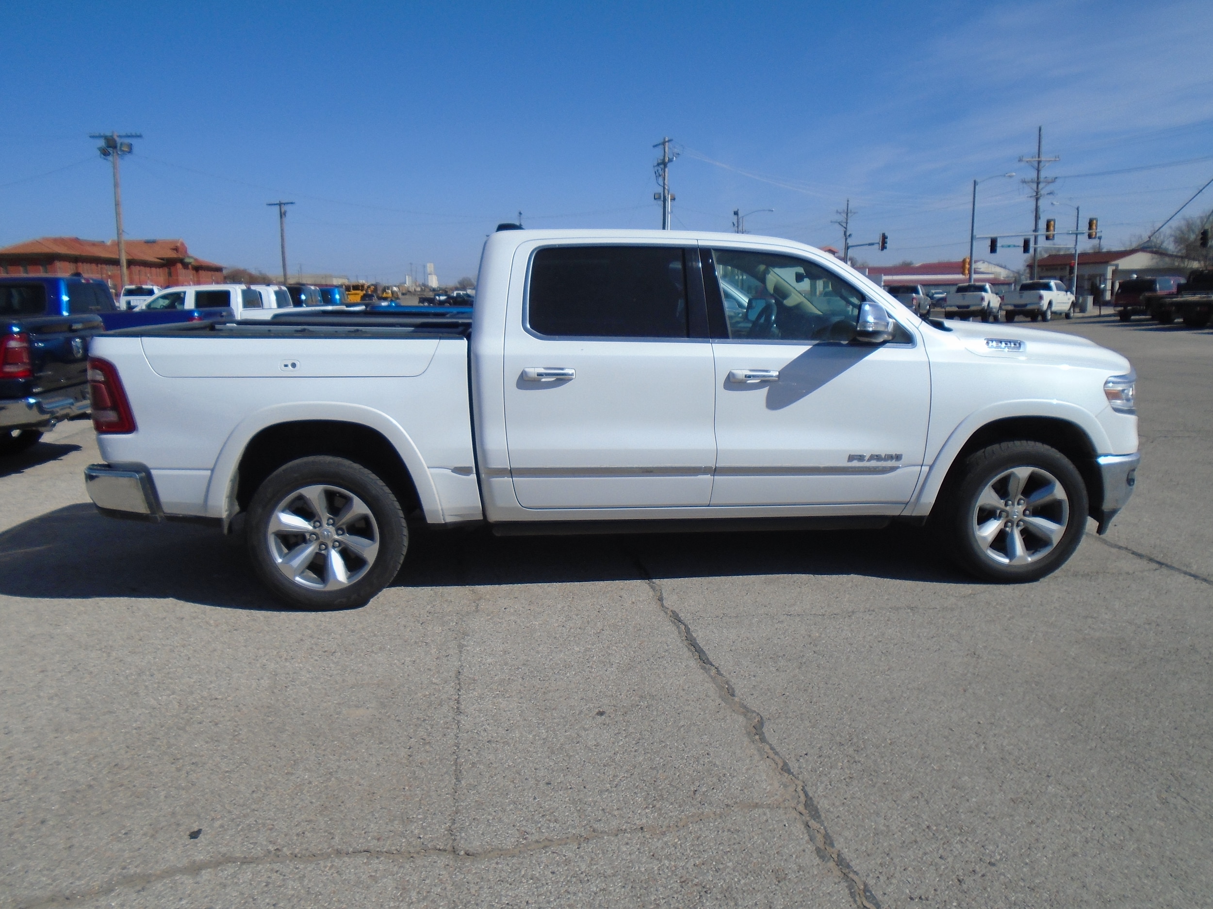 Used 2019 RAM Ram 1500 Pickup Limited with VIN 1C6SRFHT0KN809852 for sale in Dodge City, KS