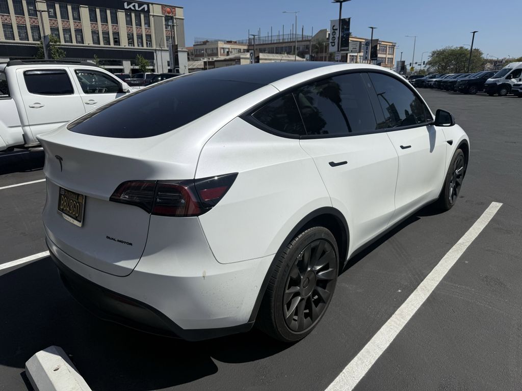 Used 2021 Tesla Model Y Long Range with VIN 5YJYGDEE5MF294867 for sale in Kansas City