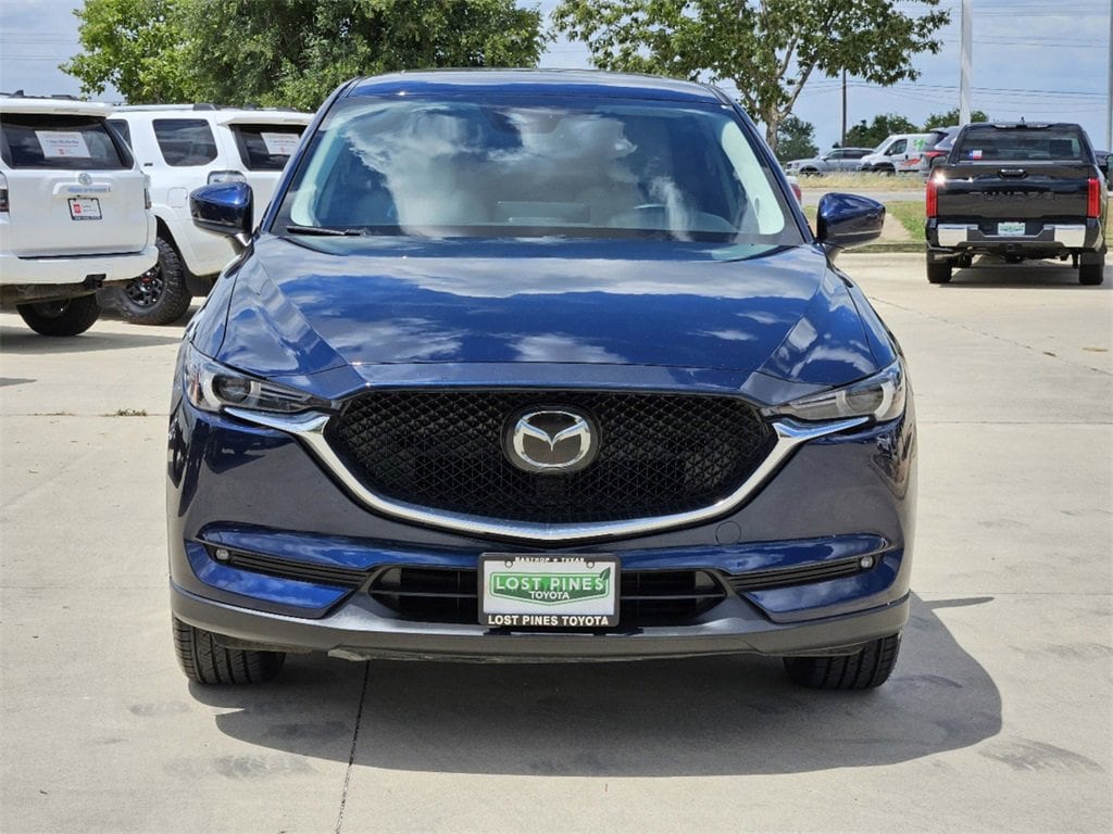 Used 2021 Mazda CX-5 Grand Touring with VIN JM3KFBDM9M0462750 for sale in Bastrop, TX