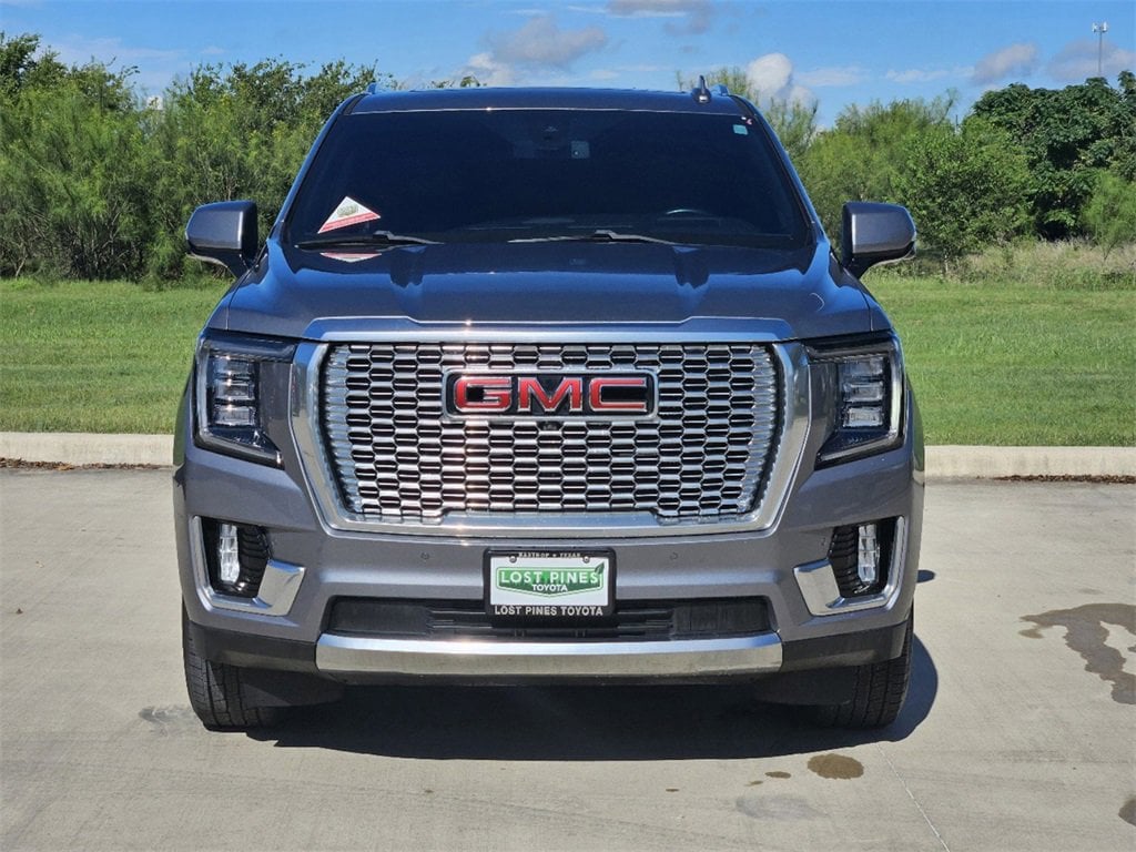 Used 2022 GMC Yukon Denali with VIN 1GKS2DKLXNR326087 for sale in Bastrop, TX