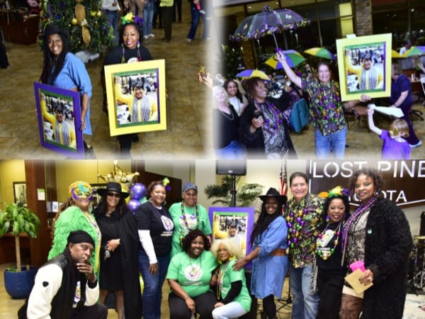  Person cheerfully signing documents.