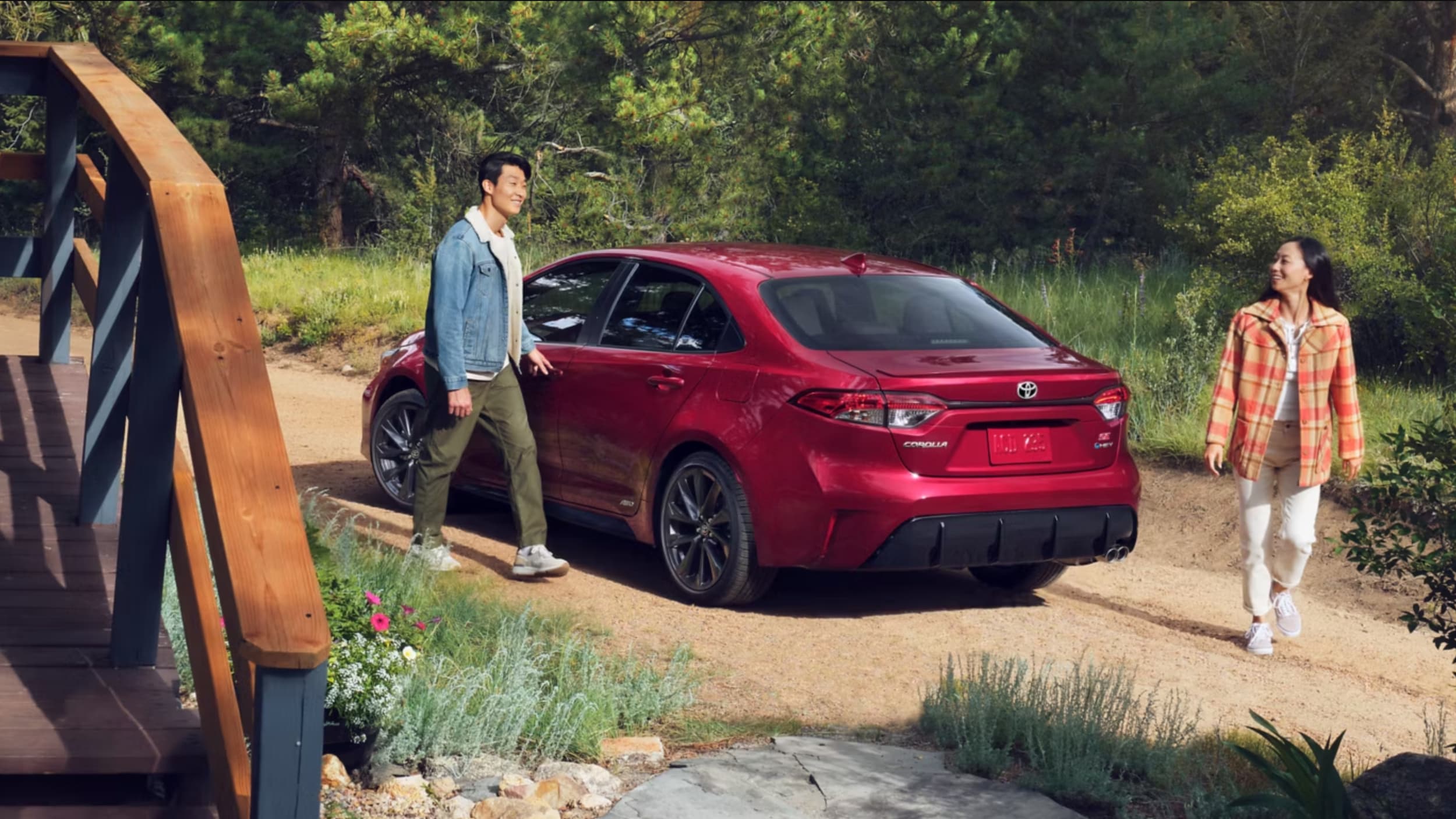 2026 Toyota Corolla Hybrid SE AWD shown in Ruby Flare Pearl for sale near Elgin, TX