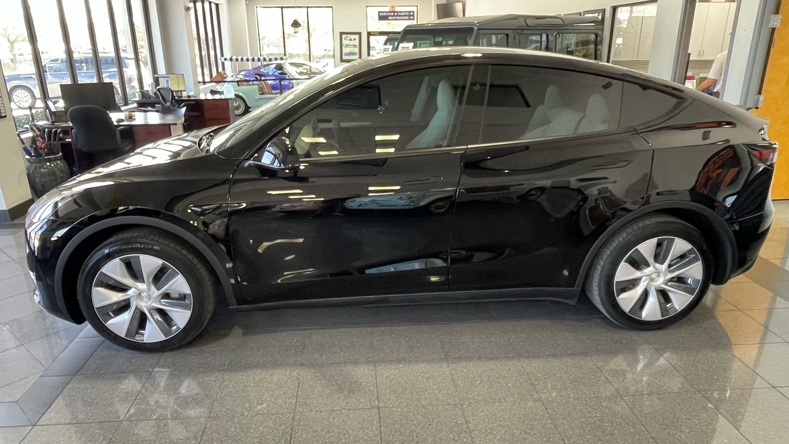 Certified 2023 Tesla Model Y Base with VIN 7SAYGDEDXPF949409 for sale in Jacksonville, FL