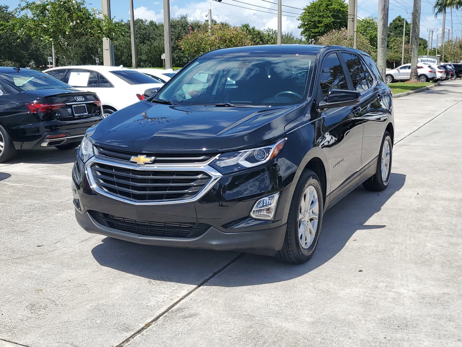 Used 2021 Chevrolet Equinox LT with VIN 2GNAXKEV9M6133411 for sale in Coconut Creek, FL