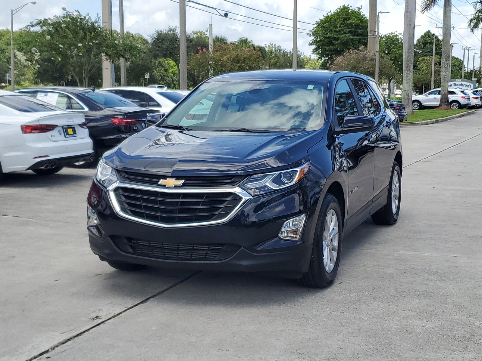 Used 2021 Chevrolet Equinox LT with VIN 3GNAXKEVXMS149490 for sale in Coconut Creek, FL