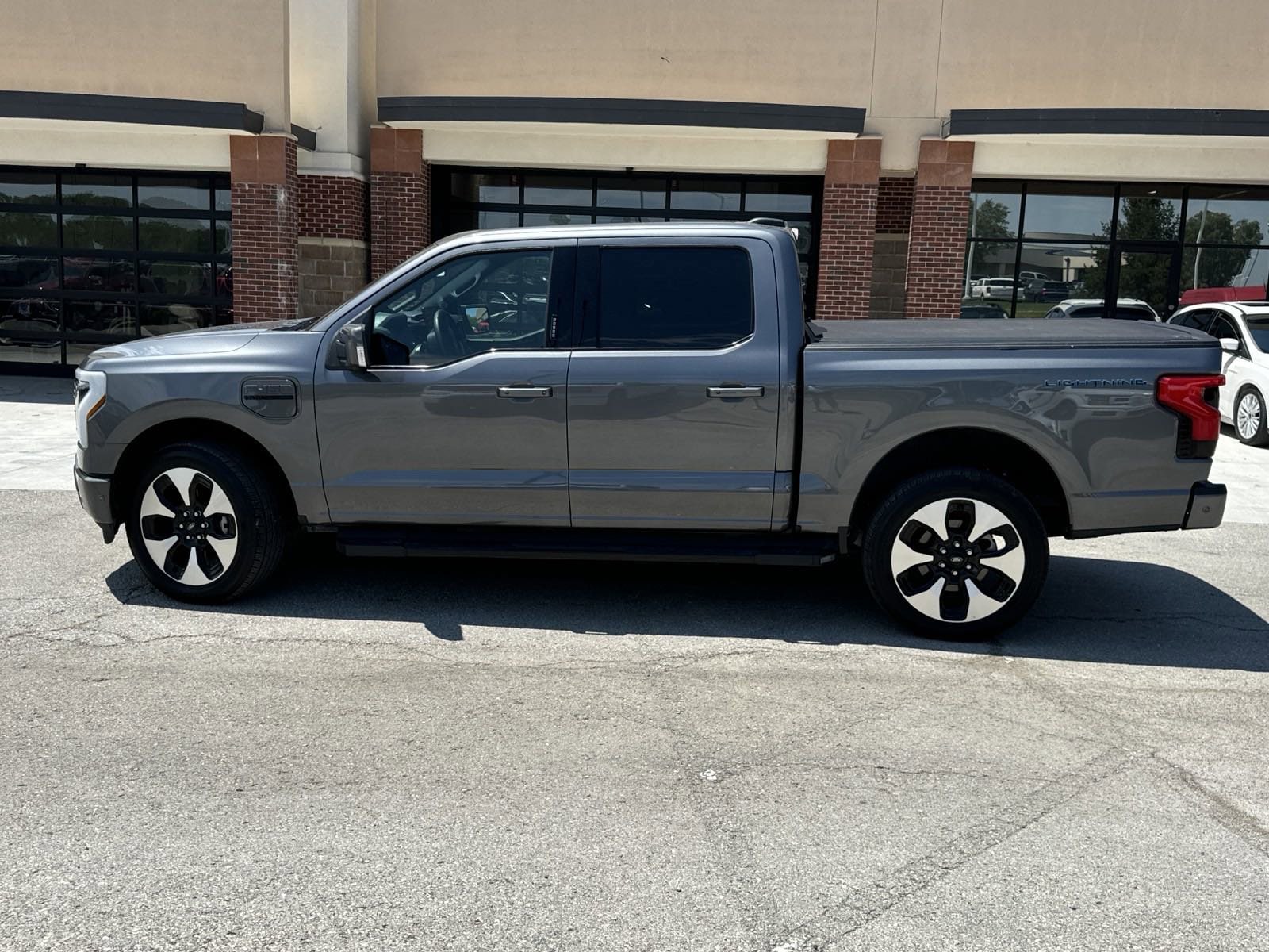 Used 2022 Ford F-150 Lightning Platinum with VIN 1FT6W1EVXNWG07692 for sale in Kansas City