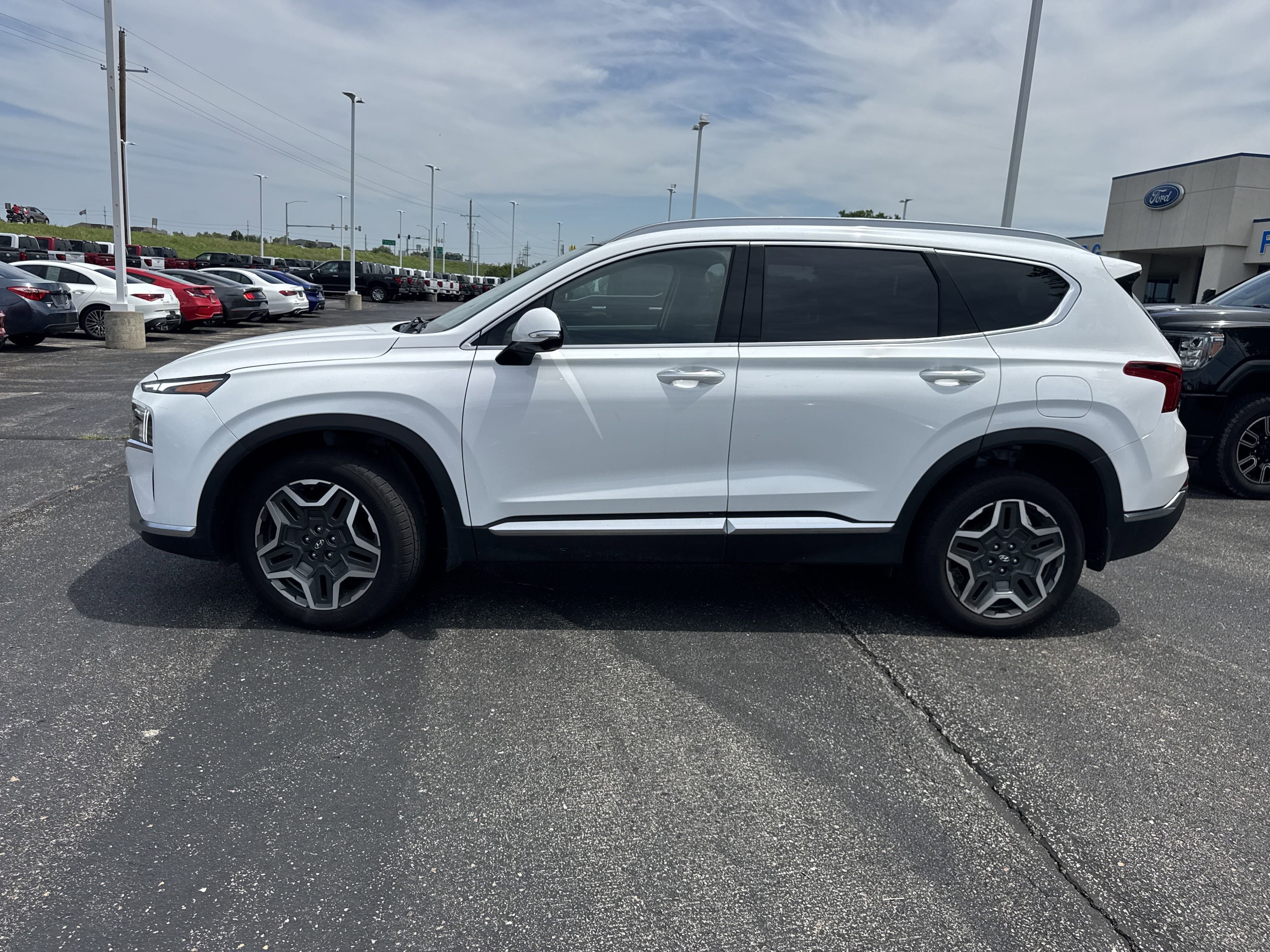 Used 2023 Hyundai Santa Fe SEL Premium HEV with VIN 5NMS3DA15PH010449 for sale in Kansas City