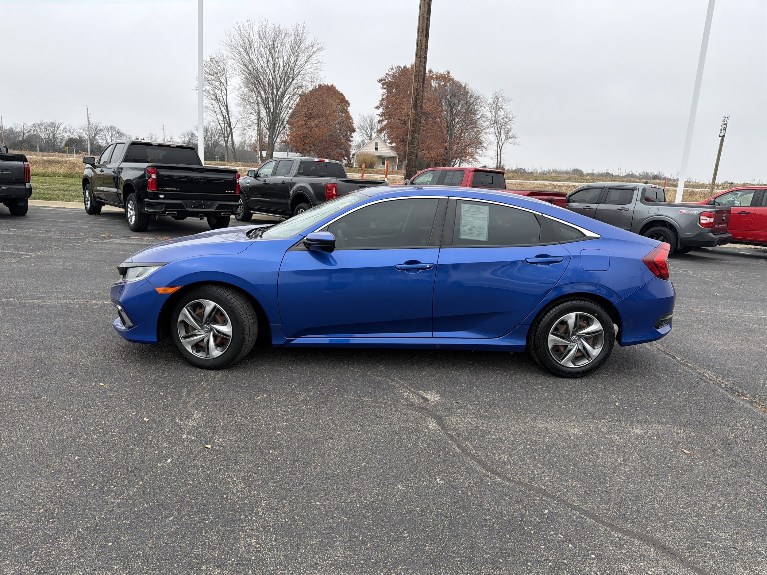 Used 2019 Honda Civic LX with VIN 2HGFC2F61KH568993 for sale in Kansas City