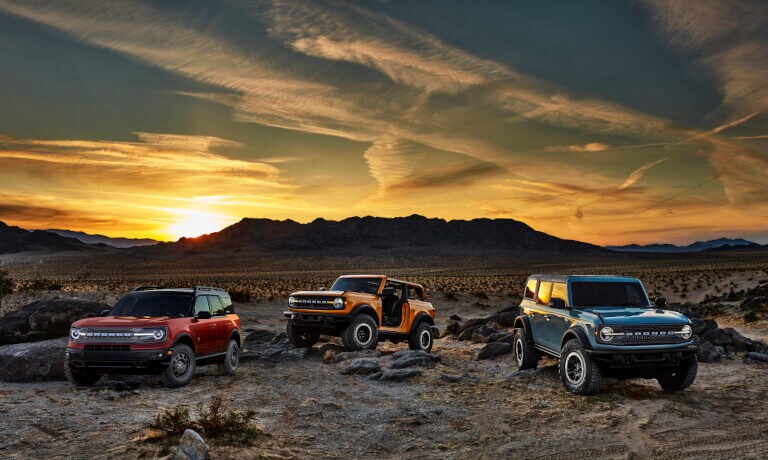 2022 Ford Bronco Exterior Three Parked In Desert At Sunset