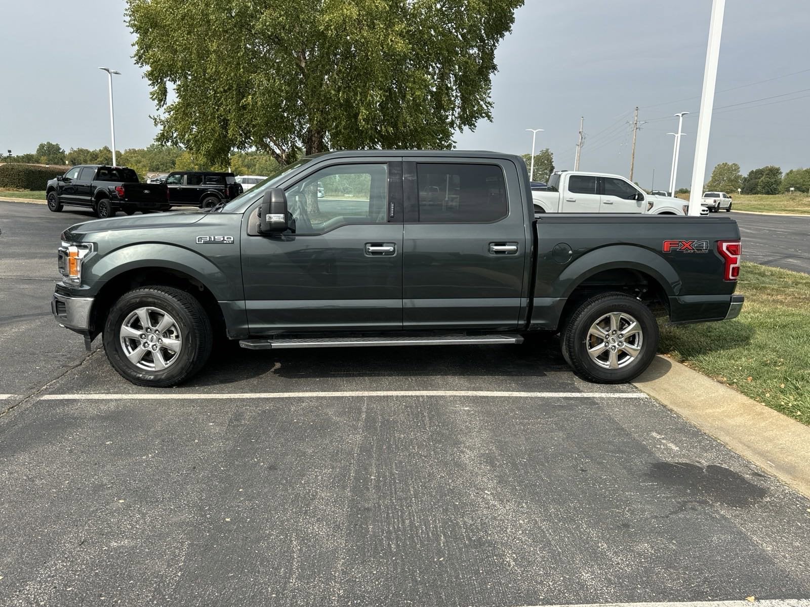 Used 2018 Ford F-150 Lariat with VIN 1FTEW1EG9JKE30552 for sale in Louisburg, KS