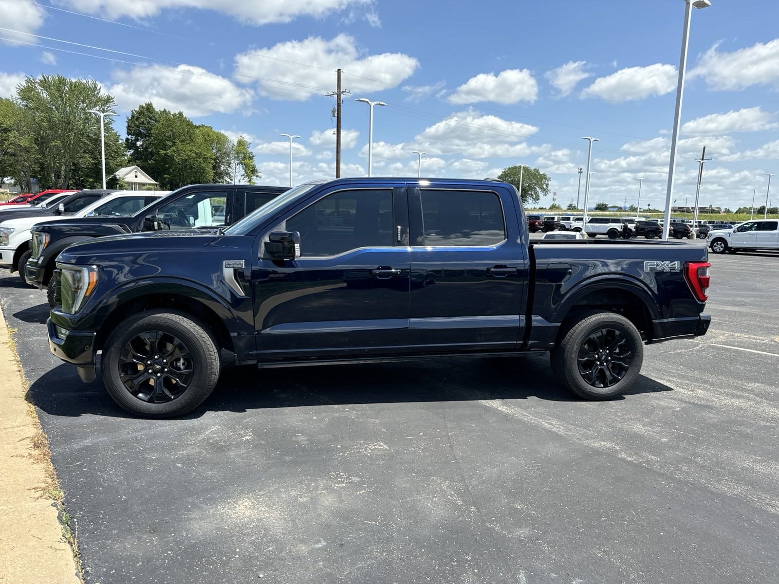 Certified 2022 Ford F-150 Platinum with VIN 1FTFW1E85NFC29257 for sale in Kansas City