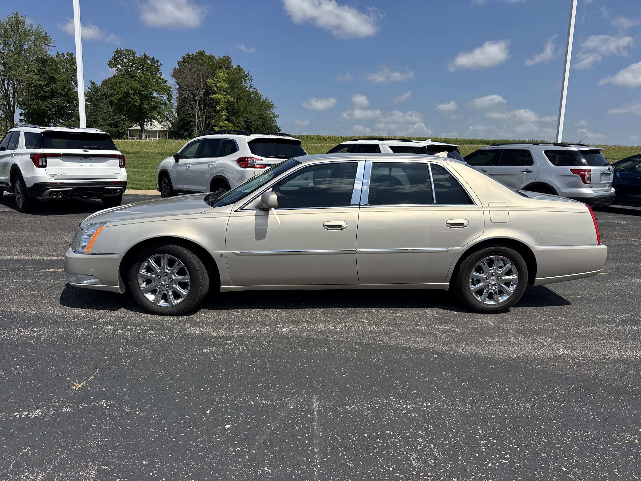 Used 2009 Cadillac DTS 1SB with VIN 1G6KD57Y49U107552 for sale in Kansas City