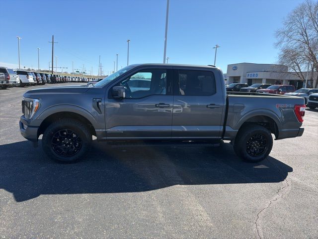 Used 2022 Ford F-150 Lariat with VIN 1FTFW1ED4NFB32452 for sale in Kansas City