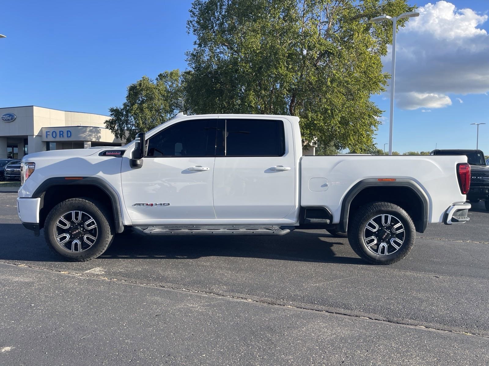 Used 2021 GMC Sierra 2500HD AT4 with VIN 1GT49PEY1MF317254 for sale in Kansas City