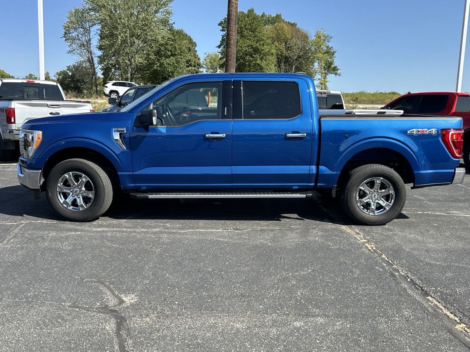 Used 2022 Ford F-150 XLT with VIN 1FTEW1EPXNKD56418 for sale in Louisburg, KS