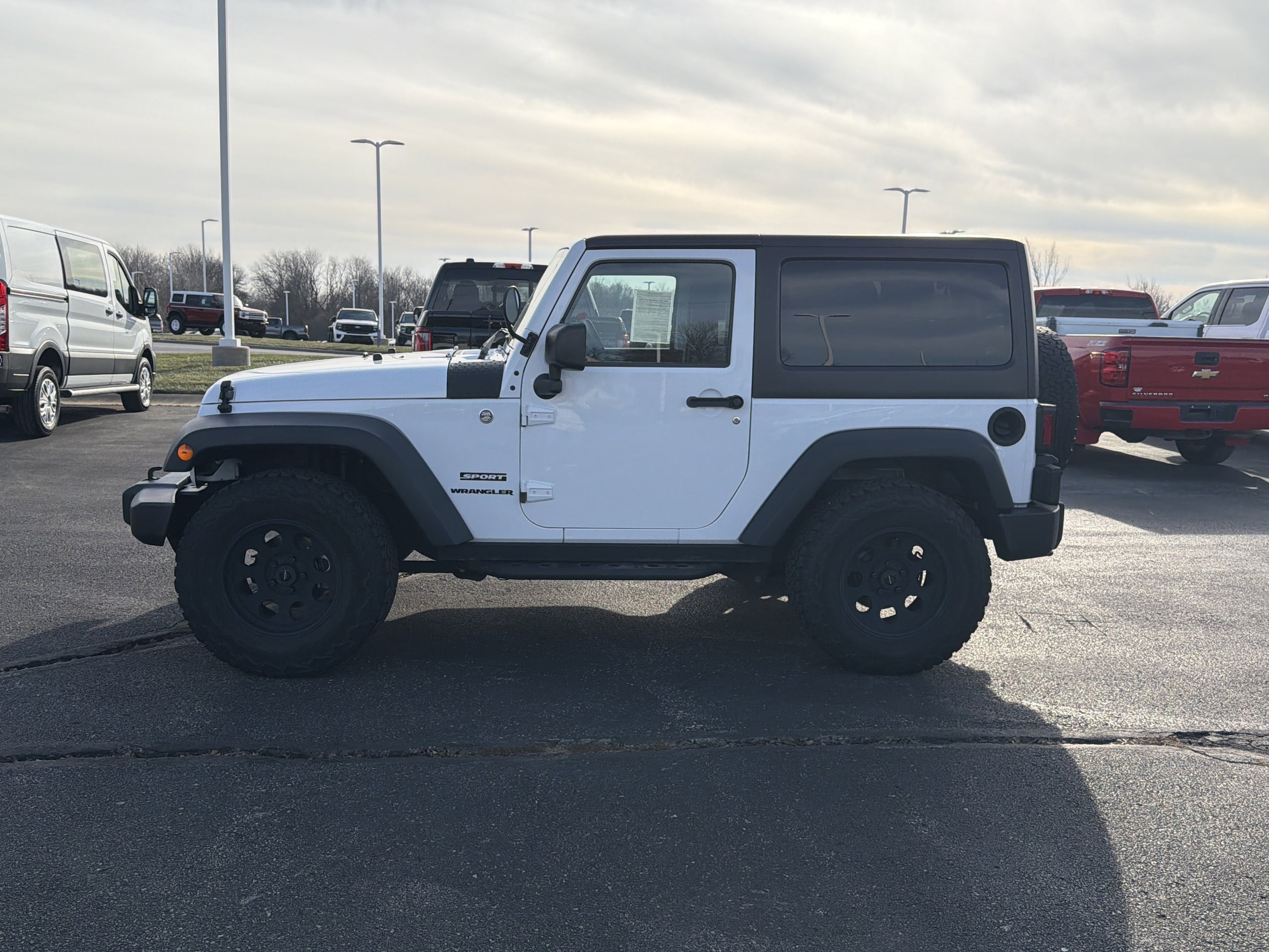 Used 2015 Jeep Wrangler Sport with VIN 1C4AJWAG0FL714461 for sale in Kansas City