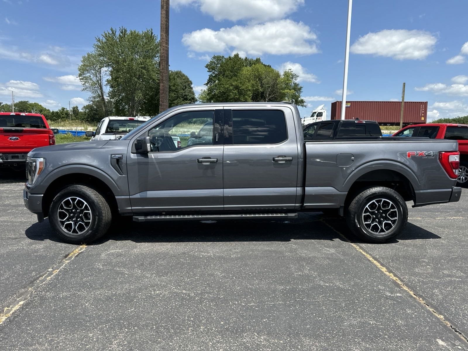 Used 2021 Ford F-150 Lariat with VIN 1FTFW1E82MFC05660 for sale in Kansas City