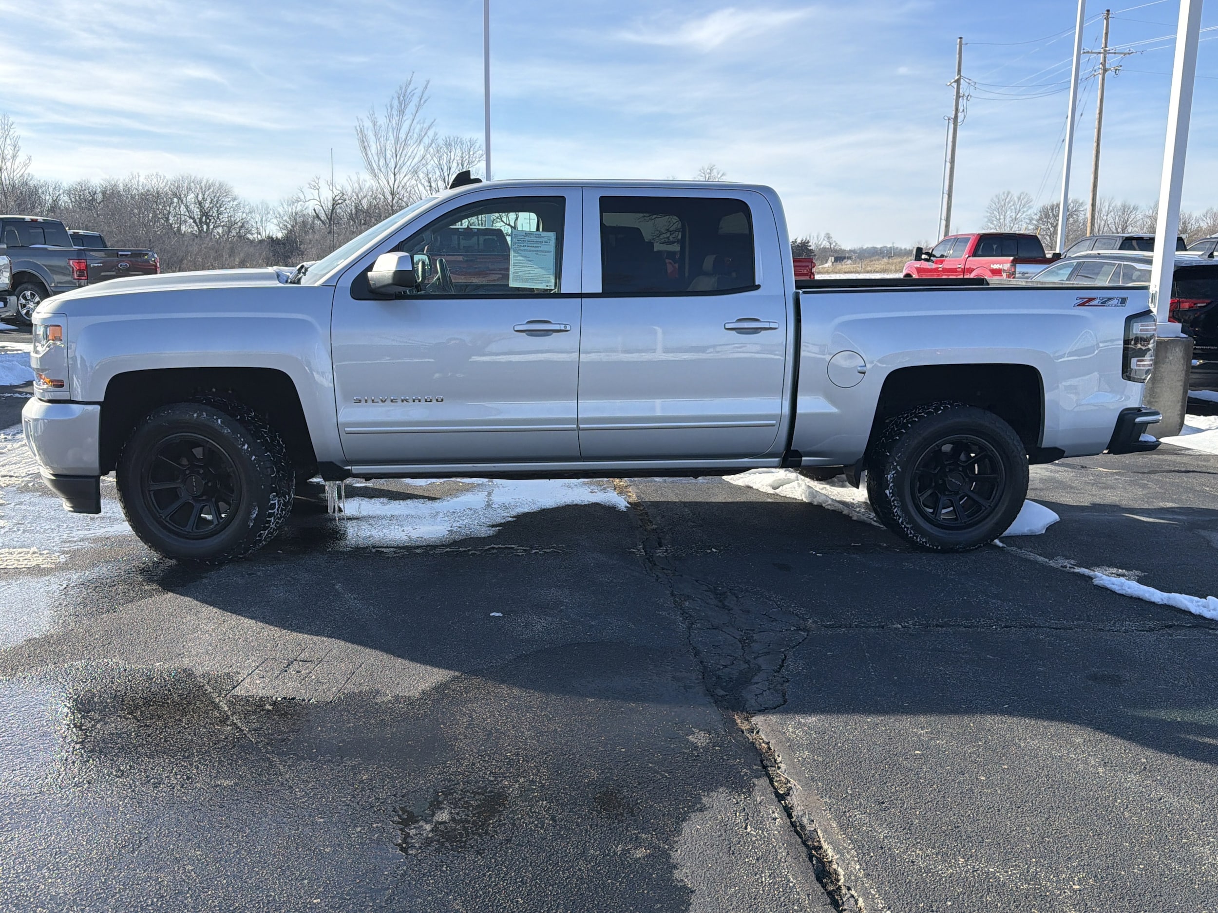 Used 2016 Chevrolet Silverado 1500 LT Z71 with VIN 3GCUKREC5GG220985 for sale in Kansas City
