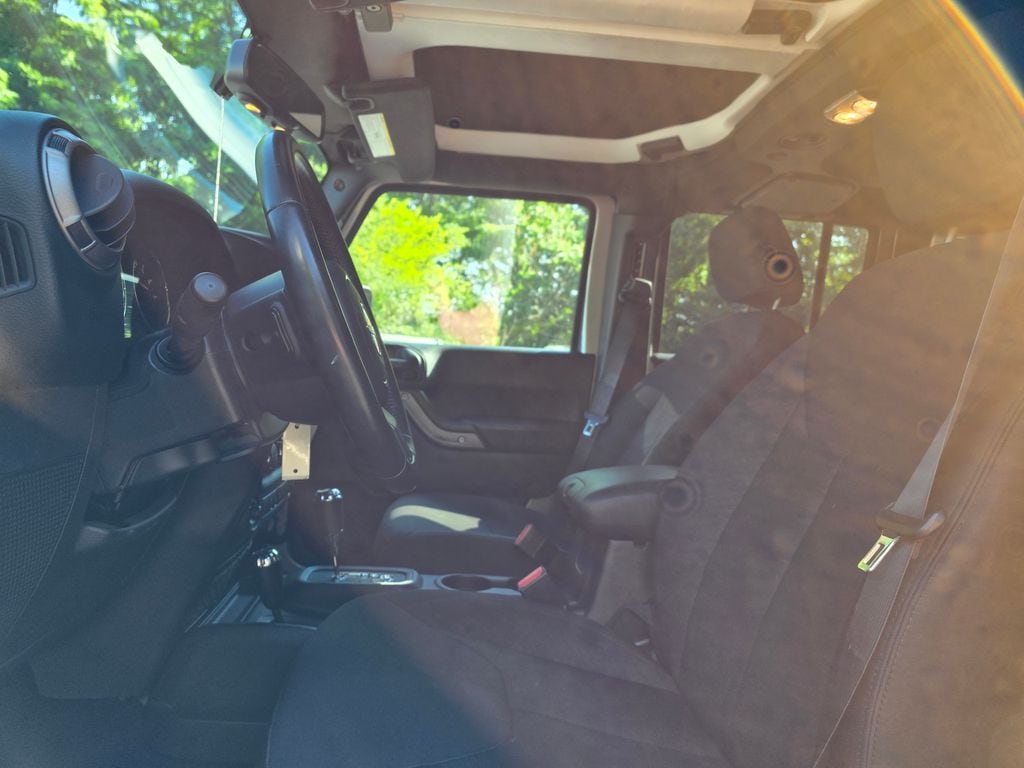 Used 2016 Jeep Wrangler Unlimited Sport S with VIN 1C4HJWDGXGL347998 for sale in Meredith, NH