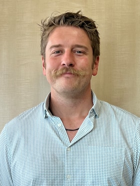 Staff member Blake Loggins from e37541cbc78a