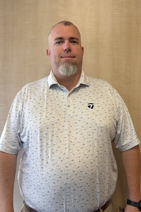 Staff member Chris Watson from ID_74312c