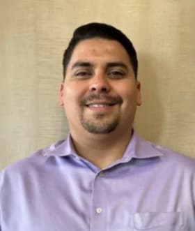 Staff member Ben Guerrero from 5b534f0464ba