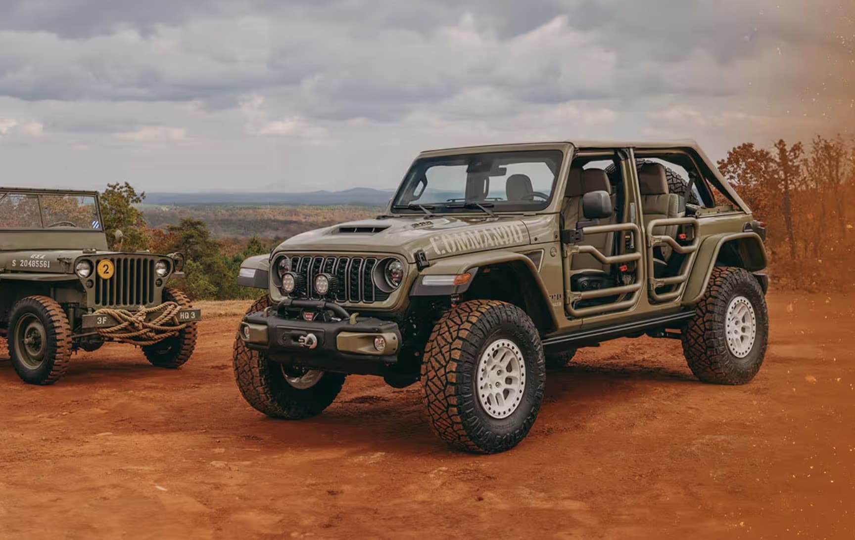 2026 Jeep Wrangler parked with a hitch-mounted trailer near the Jersey Shore