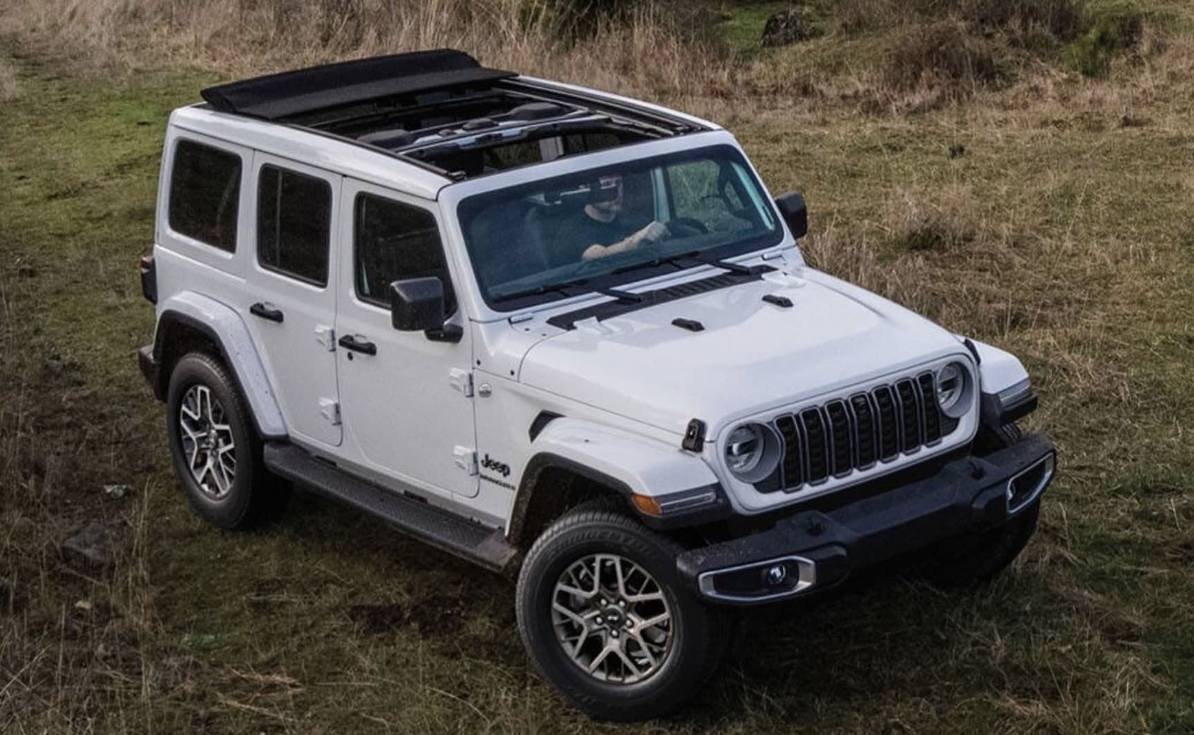 2026 Jeep Wrangler four-door interior with 12.3-inch Uconnect touchscreen