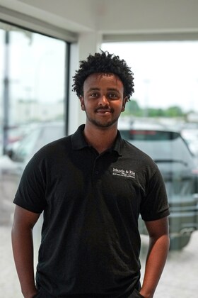 Staff member Caleb Dejene from ID_bcea95ca33c4