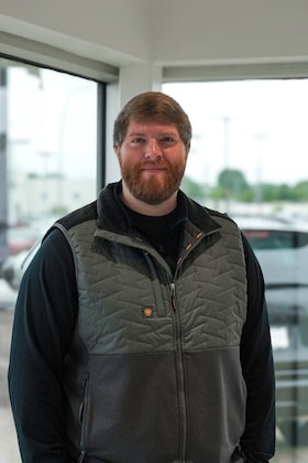Staff member Maxwell Scott from ID_ba536a604b60