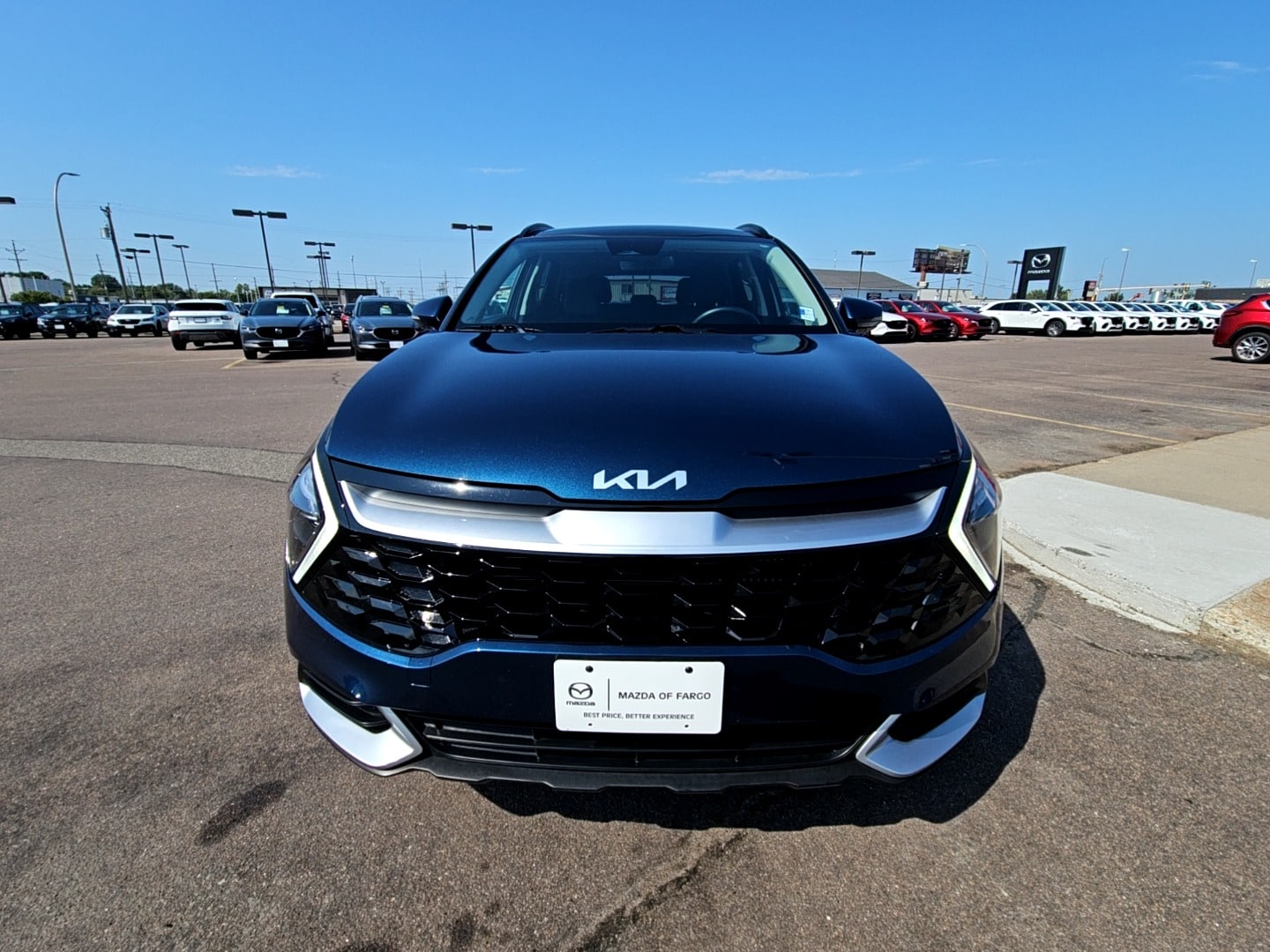 Used 2023 Kia Sportage EX Hybrid with VIN KNDPVCAG6P7043594 for sale in Fargo, ND