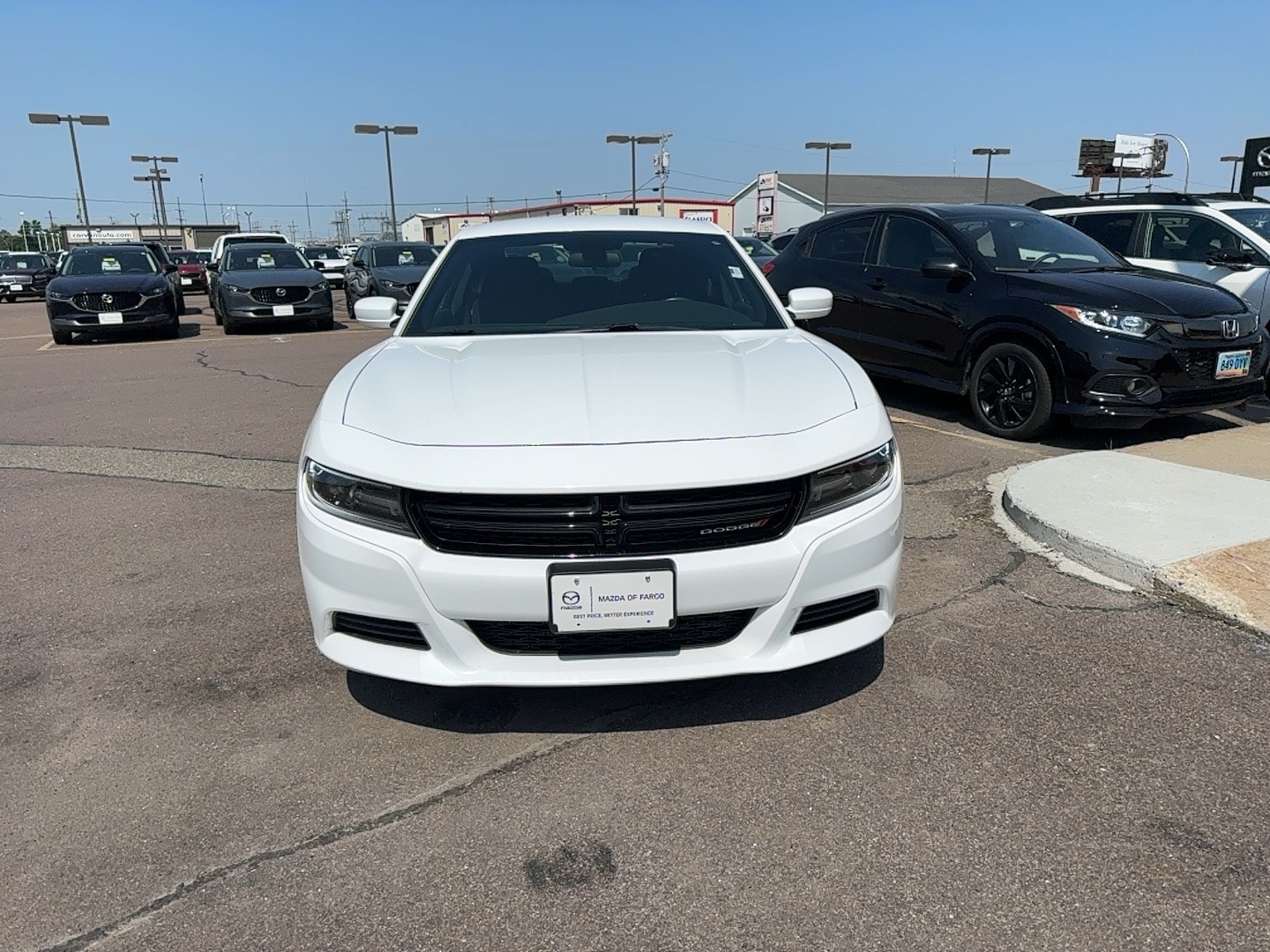 Used 2021 Dodge Charger SXT with VIN 2C3CDXBG0MH574088 for sale in Fargo, ND