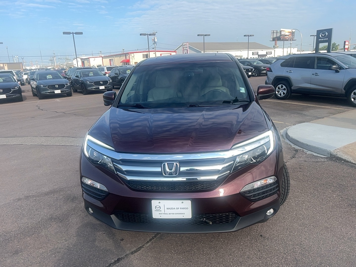 Used 2016 Honda Pilot EX-L with VIN 5FNYF6H59GB036429 for sale in Fargo, ND