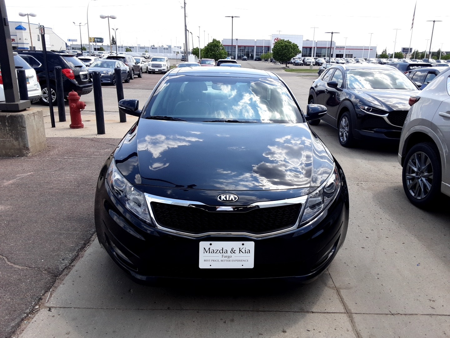 Used 2013 Kia Optima EX with VIN 5XXGN4A74DG250316 for sale in Fargo, ND