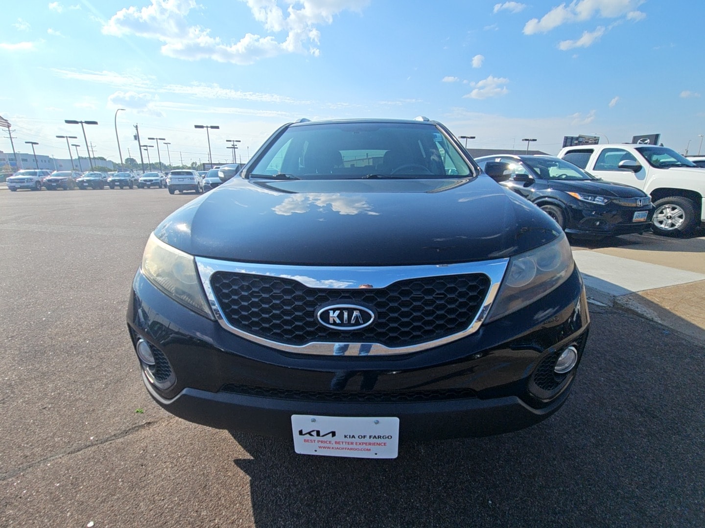 Used 2011 Kia Sorento LX with VIN 5XYKTDA16BG054964 for sale in Fargo, ND