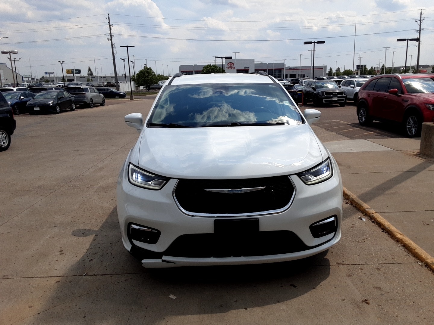Used 2021 Chrysler Pacifica Hybrid Touring with VIN 2C4RC1R78MR565922 for sale in Fargo, ND