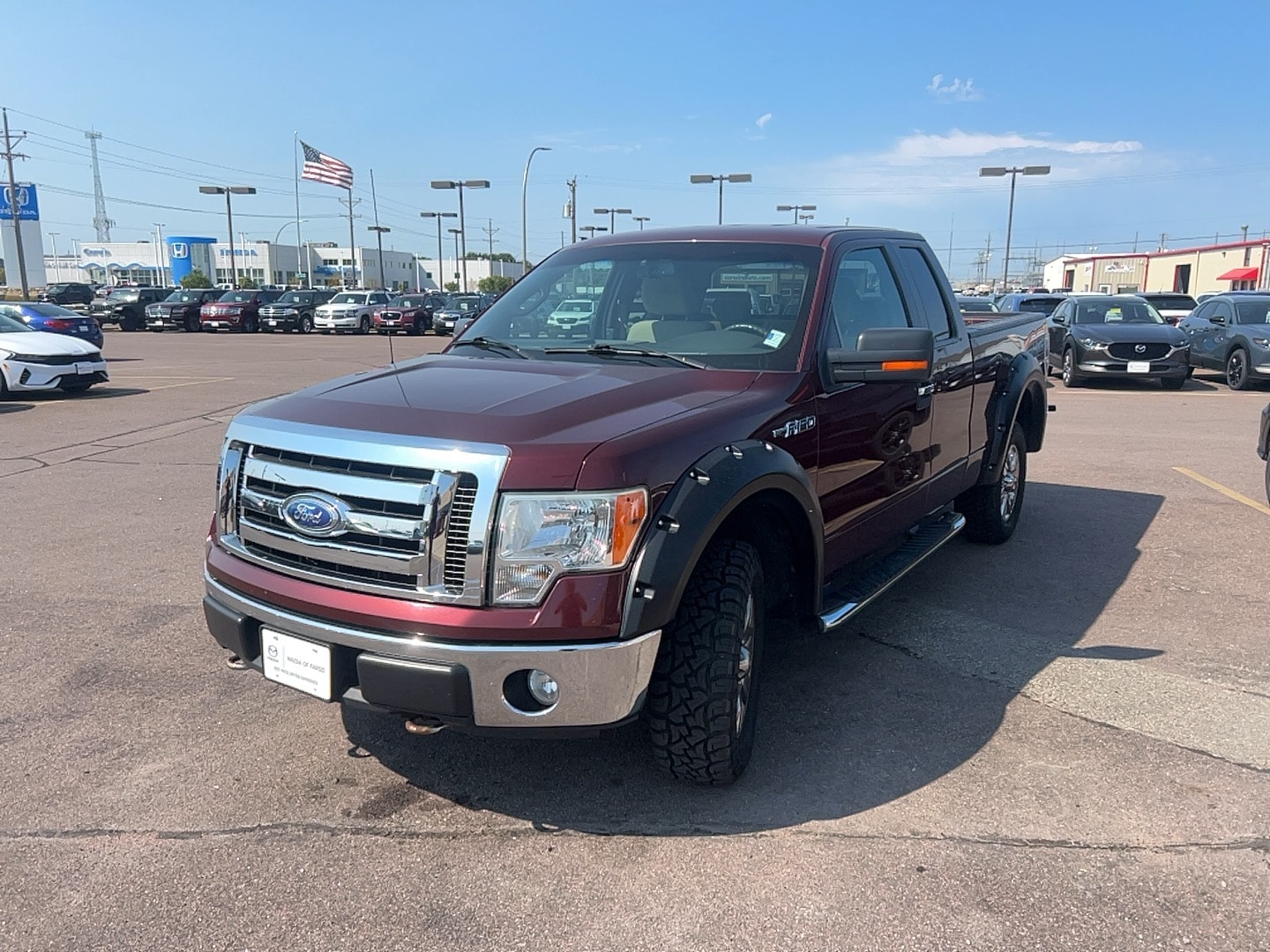 Used 2009 Ford F-150 XLT with VIN 1FTRX148X9FB26546 for sale in Fargo, ND