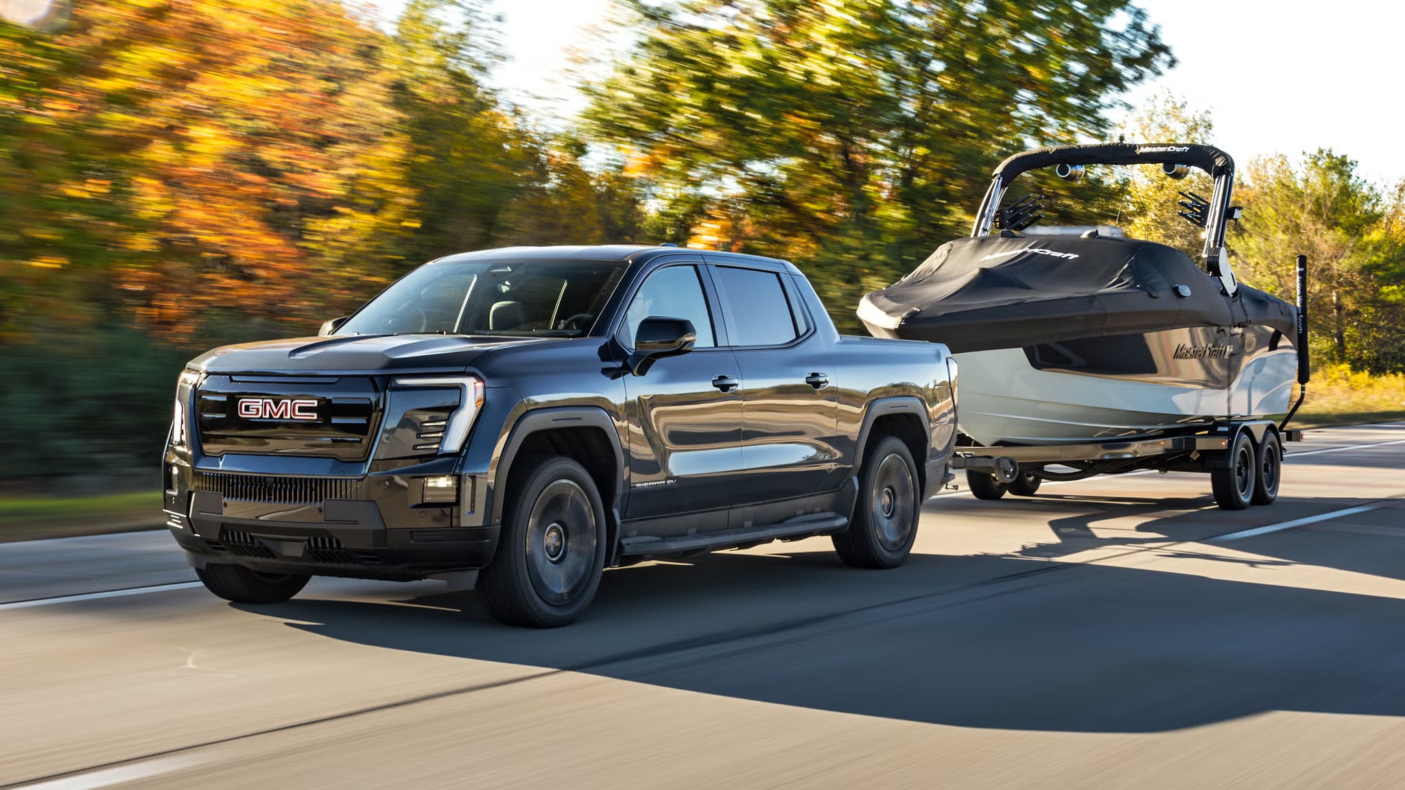 2026%20GMC%20Sierra%20EV%20Towing%20a%20Boat.jpg