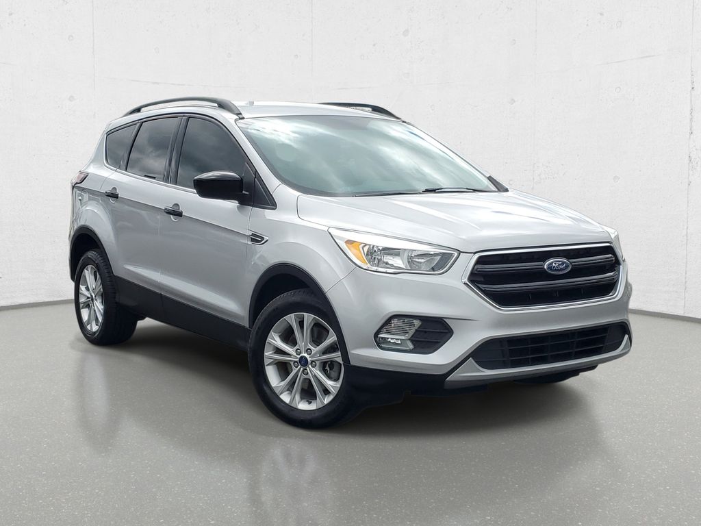 Used 2018 Ford Escape SE with VIN 1FMCU9GD3JUB23876 for sale in Owosso, MI