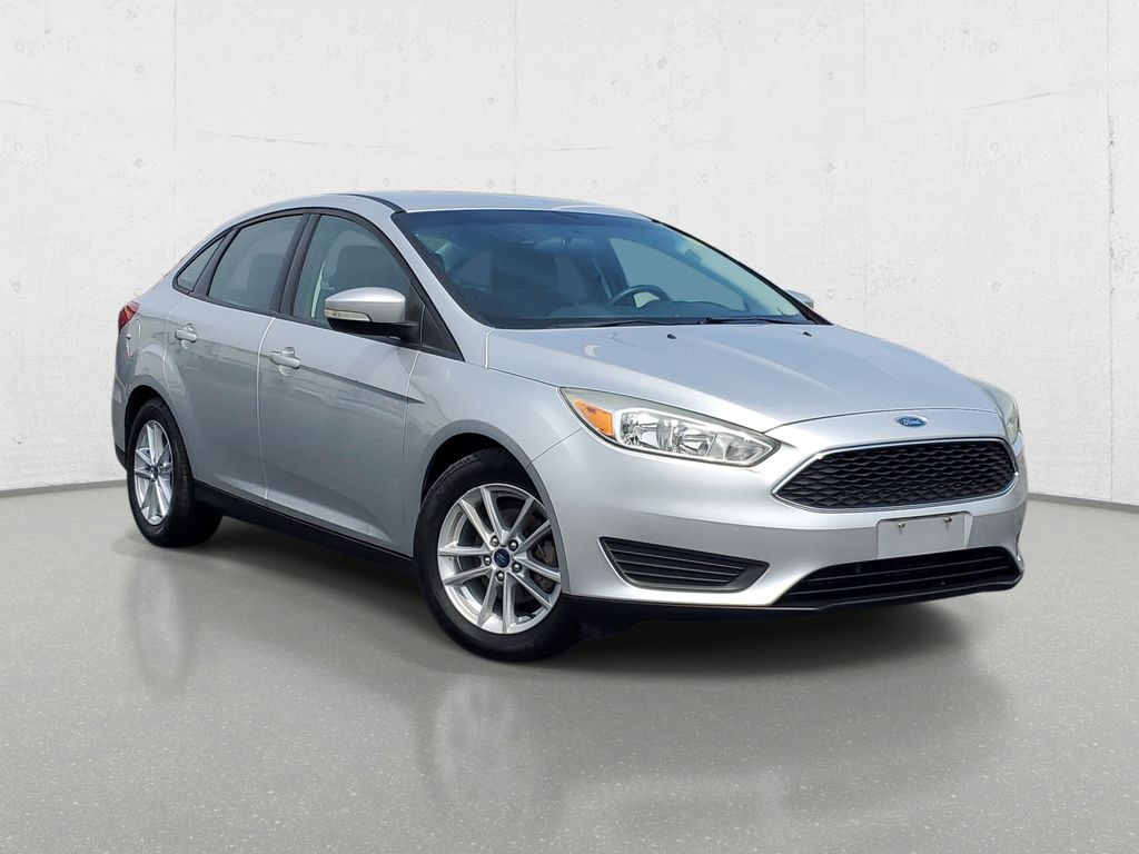 Used 2016 Ford Focus SE with VIN 1FADP3F2XGL329472 for sale in Owosso, MI