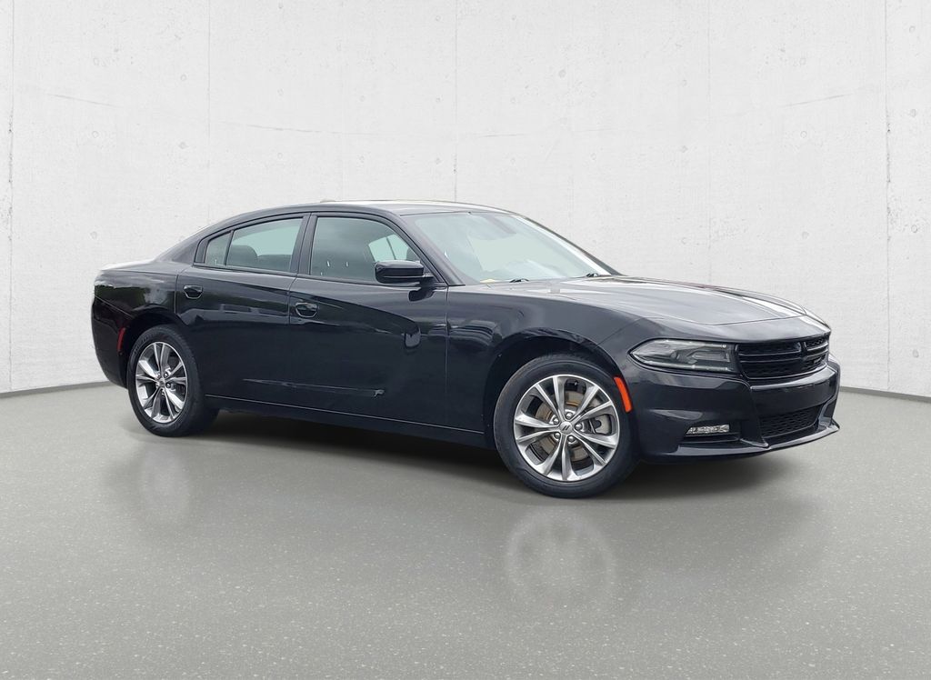 Used 2021 Dodge Charger SXT with VIN 2C3CDXJG2MH613216 for sale in Owosso, MI
