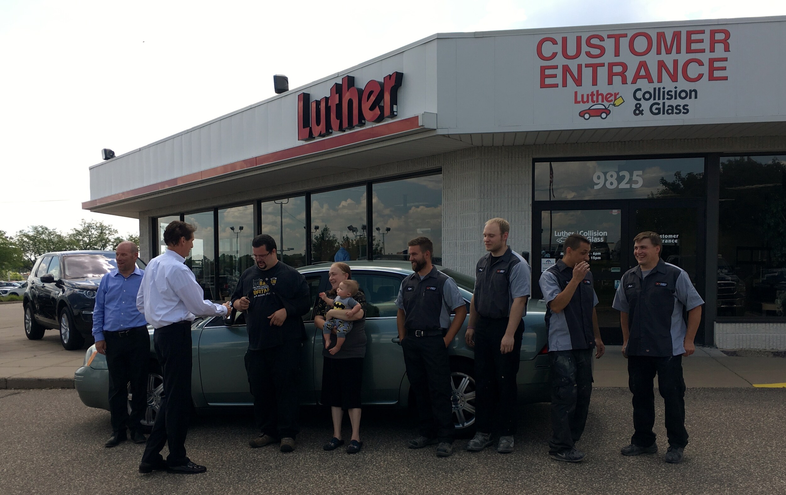Collision and Glass donates a car to a Fridley family through Cars for Neighbors 2017.JPG