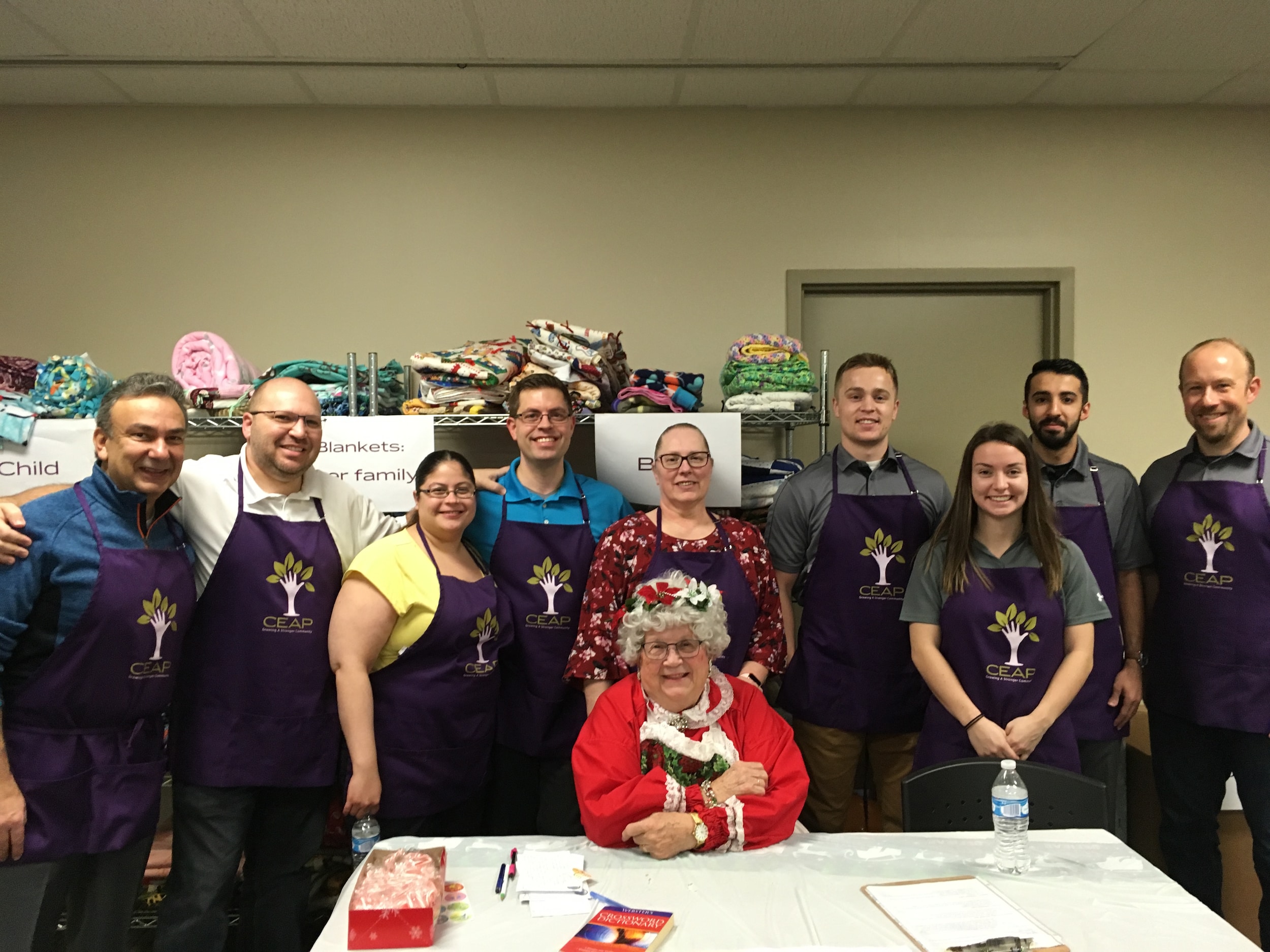 Handing out toys at CEAP in BC 12-20-18.JPG